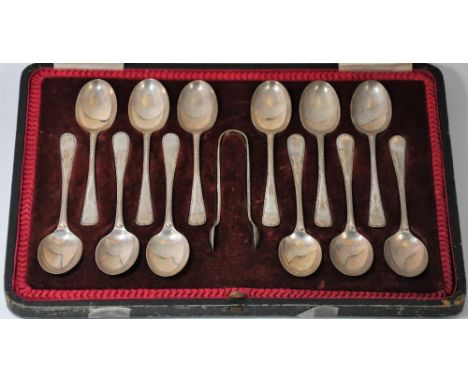 A CASED SET OF TWELVE GEORGE V SILVER COFFEE SPOONS AND A PAIR OF SUGAR TONGS, COOPER BROTHERS & SONS LTD., SHEFFIELD, 1919 s