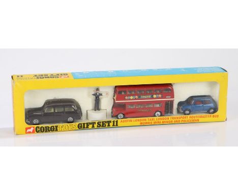 Corgi Toys gift set 11, consisting of Austin London taxi, Routemaster bus, Morris Mini-Minor and policeman, boxed