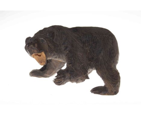 Carved wood model of a bear