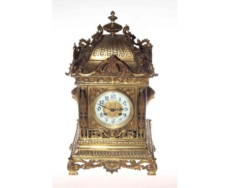 Ornate brass striking bracket clock with enamel dial