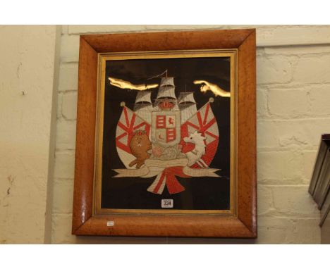 Embroidered Trapunto of the Royal Coat of Arms, in maple frame, 56.5cm by 50cm, overall