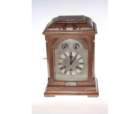 Oak striking bracket clock with silvered dial