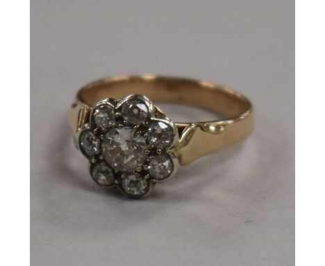 A 15ct gold and eight stone diamond cluster ring, size K.