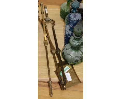 A set of brass fire tools
