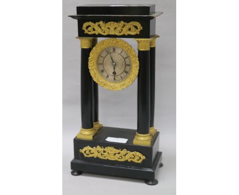 A portico clock and pendulum height 40.5cm