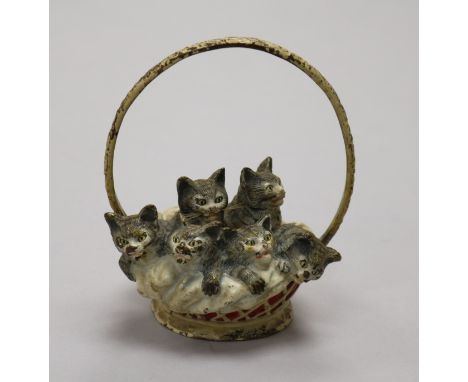 A cold painted bronze figure cats in basket