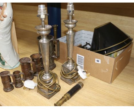 A quantity of mixed collectables including a pair of lamps, clip-on skates, tools, measures, telescope, etc. lamps height 40c