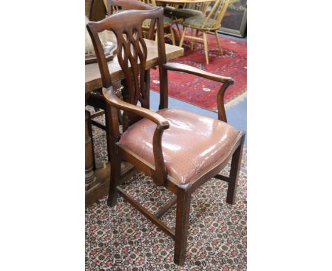A set of seven Chippendale style dining chairs