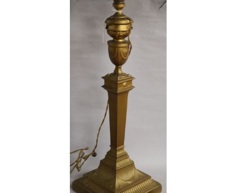 An Edwardian silver table lamp, (later modified for electricity, by Walker & Hall, Shefield, 1903, (later gilded), overall 54