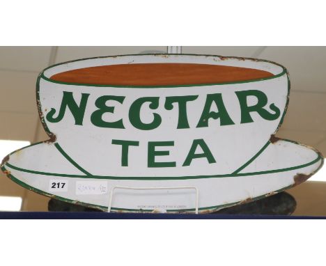 A Nectar Tea enamel sign in the shape of a teacup