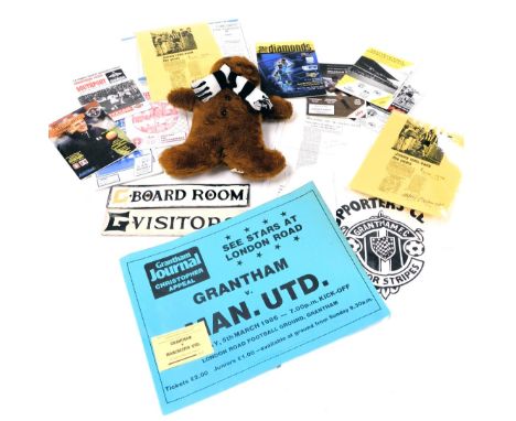 Grantham Interest. Grantham FC memorabilia, including a gingerbread man mascot, advertising poster and entrance ticket for Gr