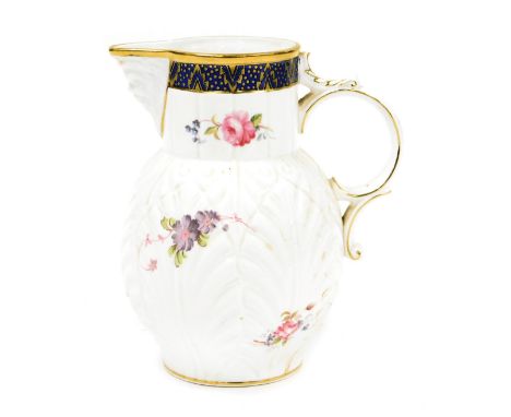 A Coalport porcelain reproduction of the Caughley Mask-Head jug, printed marks, 19cm high. 