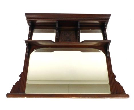 A Victorian mahogany over mantle mirror, the dentil moulded pediment over a pair of rectangular bevelled mirror plates flanki