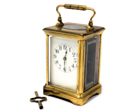 A late 19thC French brass cased carriage clock, rectangular enamel dial bearing Arabic numerals, single barrel movement, the 