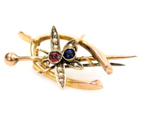 A Victorian 9ct gold seed pearl, ruby and sapphire brooch, formed as a horseshoe, pin and insect, 3.1g. 