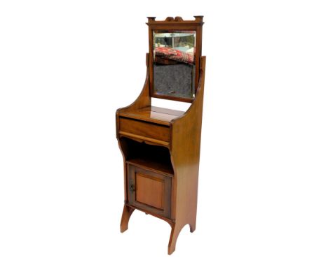 A late Victorian mahogany gentleman's shaving stand, the swing frame mirror inset a rectangular bevelled glass plate, above a