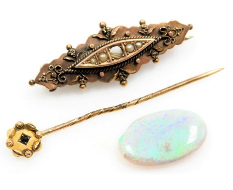 A Victorian 9ct gold and seed pearl set brooch, central stone lacking, 9ct gold and sapphire tie pin, 4.1g, and an opal caboc