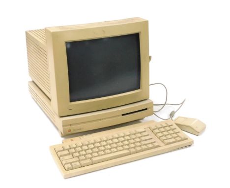 A Macintosh LC computer, model number M0350, together with a 12" RGB display, M1296Z, keyboard and cables. 