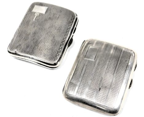 A George VI silver cigarette case, with engine turned decoration, rectangular vacant reserve, Birmingham 1939, and a George V