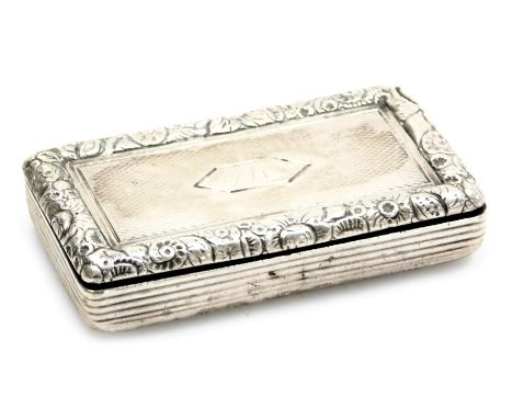 An early 19thC snuff box, of rectangular section, the lid with engine turned decoration, with vacant reserve, within a floral