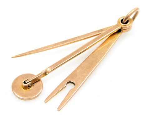 A George V Dunhill 9ct gold pipe tool, with three implements, engraved Dunhill London, Birmingham 1927, 11.3g.