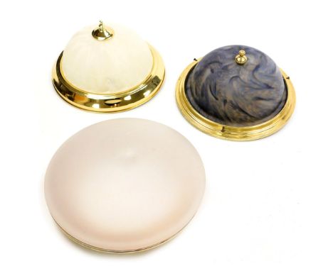 A 20thC frosted glass and brass framed ceiling light, 30cm wide, and two further ceiling lights, with mottled decoration, one