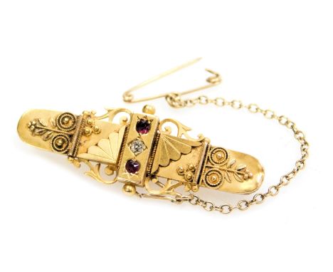 A Victorian Etruscan Revival 15ct gold ruby and diamond brooch, with safety pin, 4.0g. 