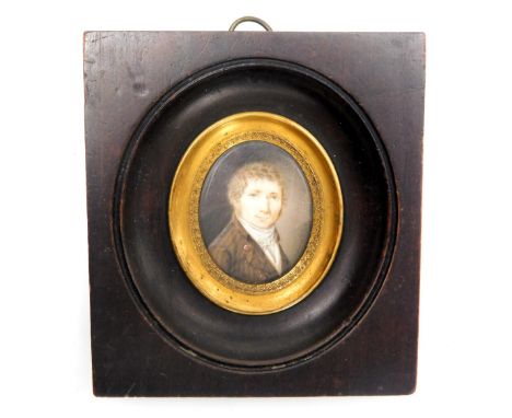 A late 18thC miniature portrait, head and shoulders study of a gentleman, framed, 3.5cm x 2.5cm.