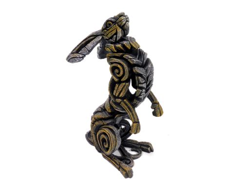 An Edge resin sculpture of a hare, modelled raised on its haunches, 51cm high.