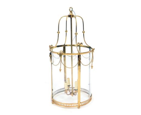 A Victorian style brass hall lantern, with four internal branches, and four glass panels, 82cm high. 