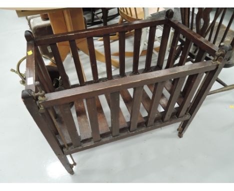 A vintage dolls cot