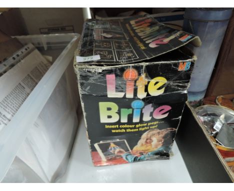 A vintage childrens toy bright light by MB games