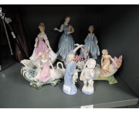 A selection of vintage ceramic figurines including Royal doulton Grandmothers dress