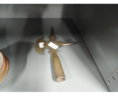 An antique brass cast replica Halberd axe head