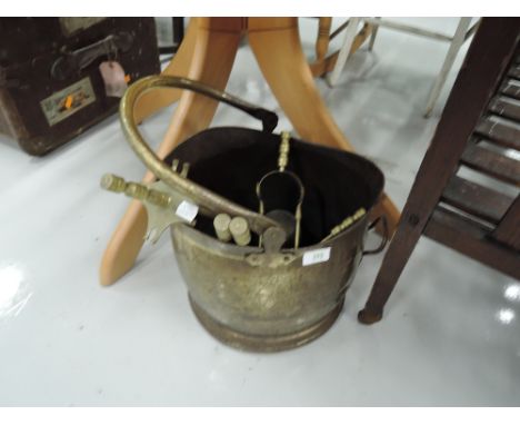 A vintage brass coal helmet etc