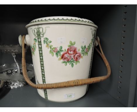 A large vintage ceramic lidded container with print and hand decoration