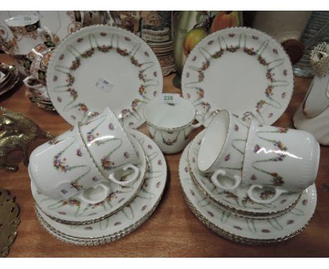 A selection of vintage tea cups saucers and plates
