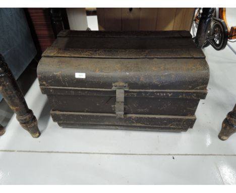 A vintage tin trunk