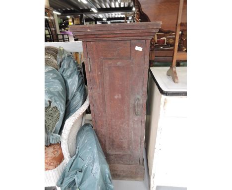 A vintage oak pedestal cupboard