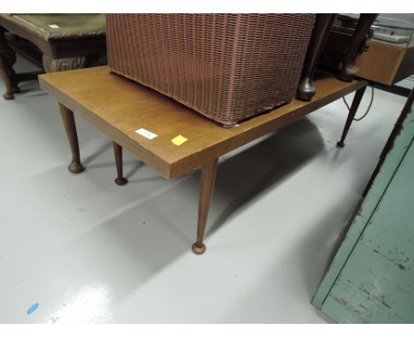 A vintage teak Meredew coffee table