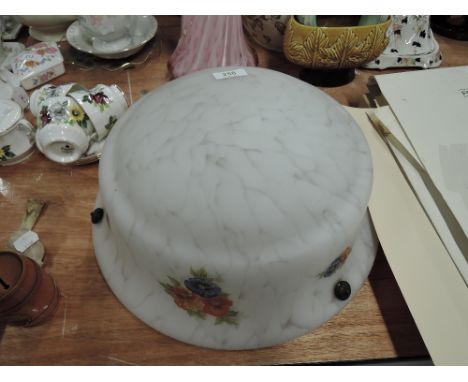 A vintage fly catcher lamp shade with floral print
