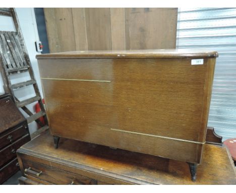 A vintage oak bedding box