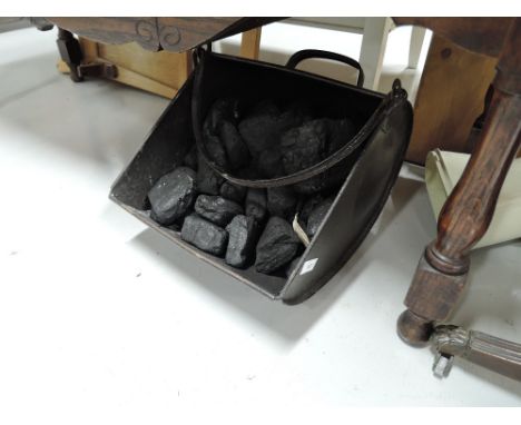 A vintage coal bucket and contents