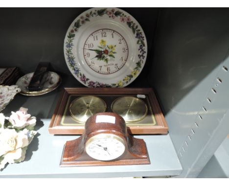 A selection of house hold decorations including clocks and barometer