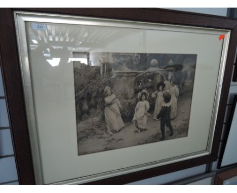 A large print of children playing in period frame