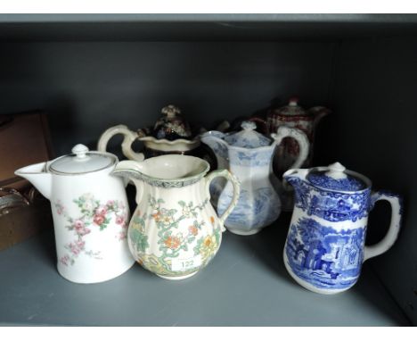 A selection of vintage ceramic jugs including blue and white transfer print