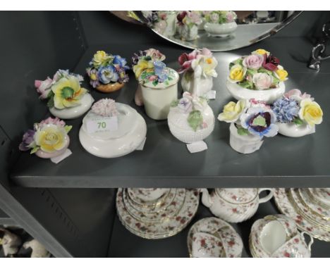 A selection of vintage ceramic floral themed decorations