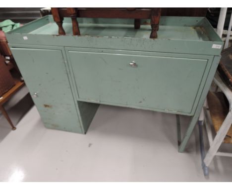 A vintage 1950's metal garage or engineers work bench 