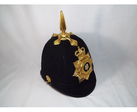 A helmet with badge marked Worcester & Sherwood Foresters