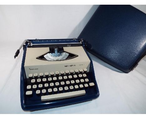 A Remington Envoy III Sperry Rand portable typewriter, good condition 